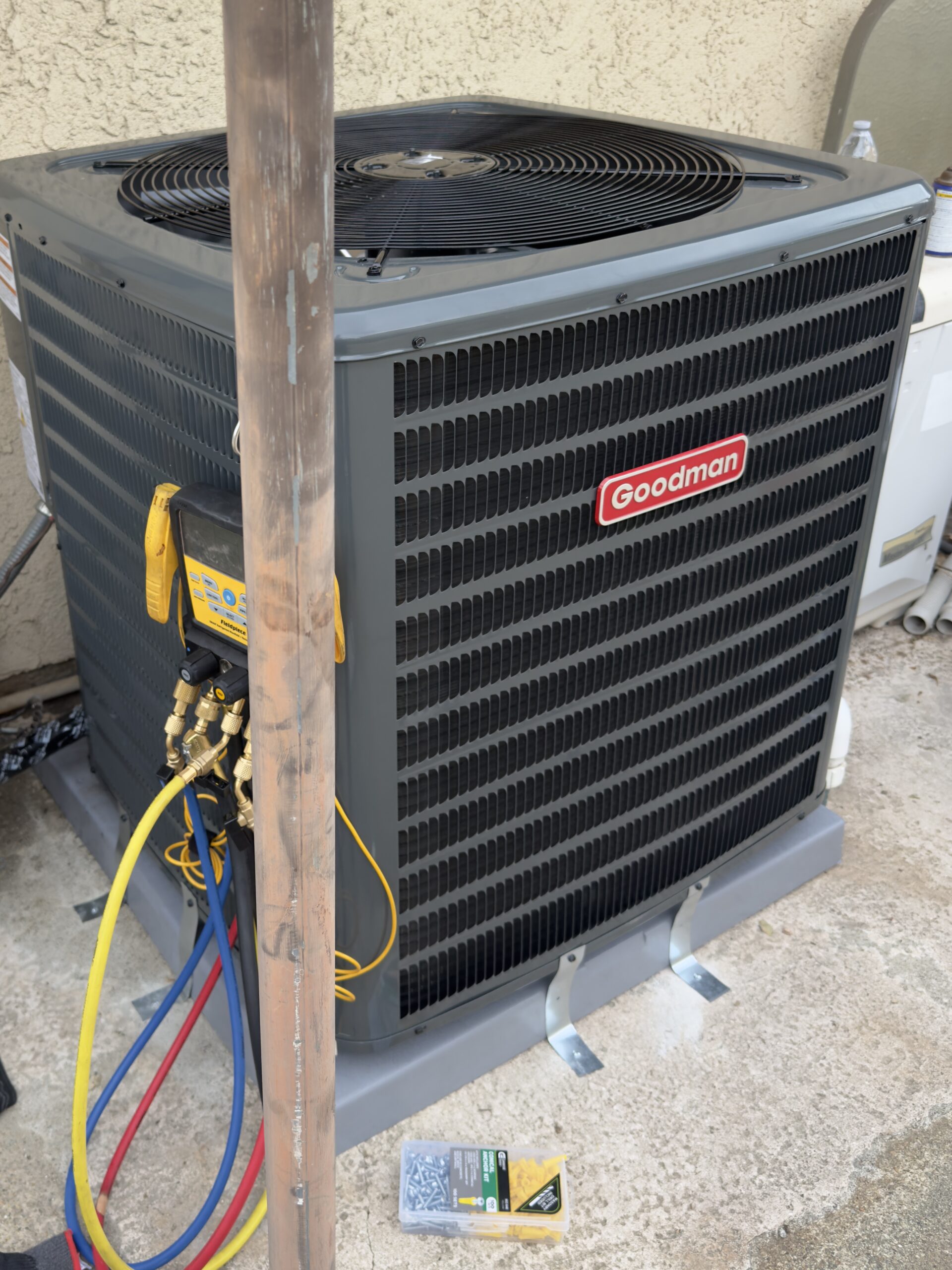 Goodman outdoor air-conditioning condenser during residential installation