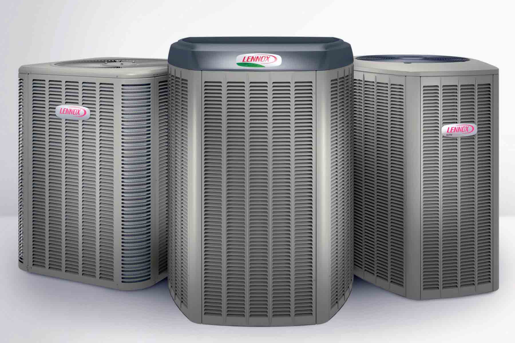 Three Lennox outdoor condenser units